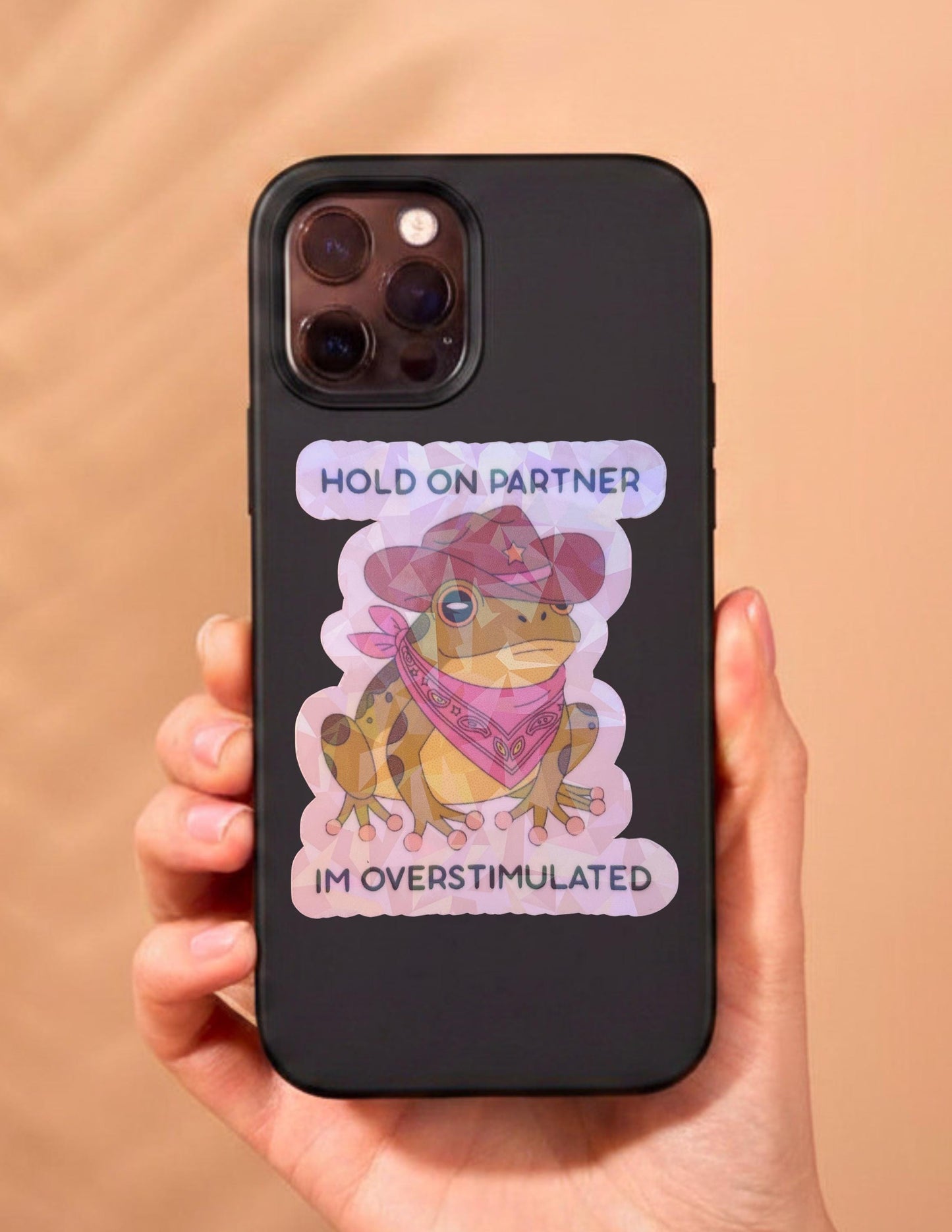 Hold On Partner I’m Overstimulated Holographic Sticker | Funny Frog Vinyl Decal | Mental Health Humor Sticker | Anxiety Gift | Cute Cowboy Frog Laptop Water Bottle Sticker