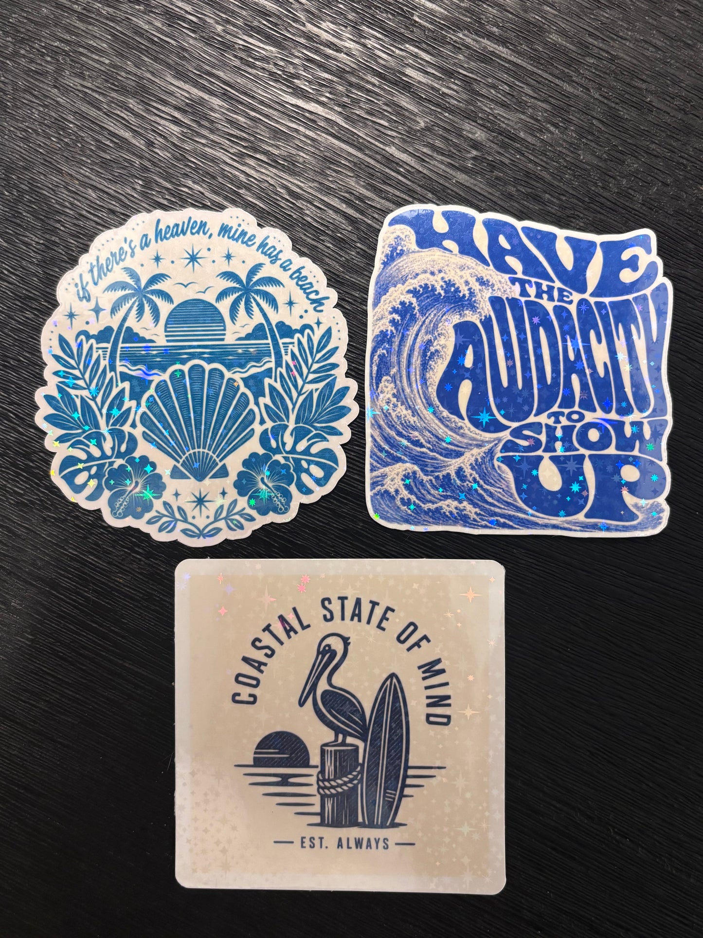 Bring the coast with you wherever you go with this holographic ocean-themed sticker 3-pack!