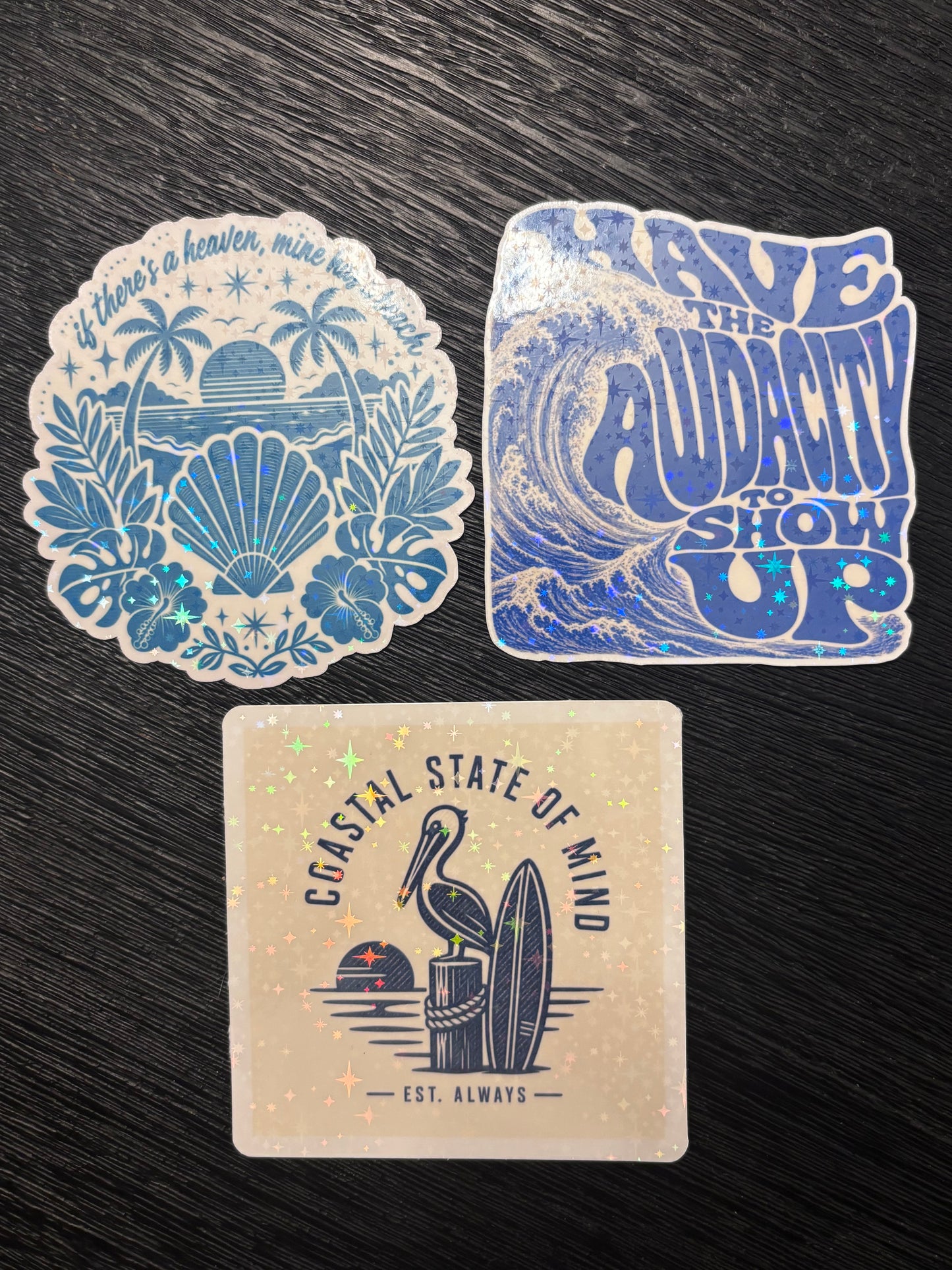 Bring the coast with you wherever you go with this holographic ocean-themed sticker 3-pack!