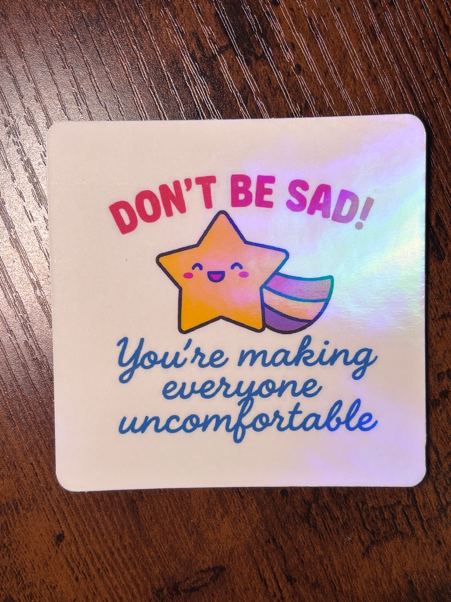 “Don’t Be Sad! You’re Making Everyone Uncomfortable” Holographic Shooting Star Sticker | Funny Sarcastic Sticker | Waterproof Vinyl Sticker for Water Bottles, Laptops & More